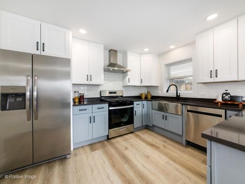 Tiny photo for 1701 N Sayre Avenue, Chicago, IL 60707 (MLS # 12635658)