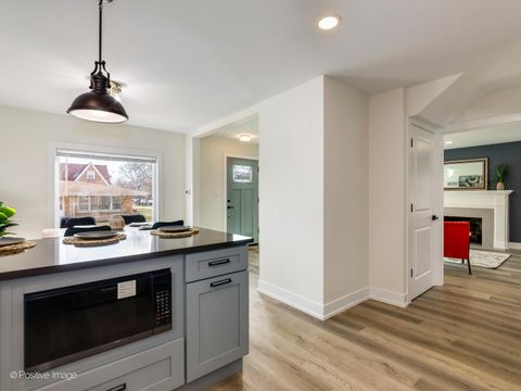 Tiny photo for 1701 N Sayre Avenue, Chicago, IL 60707 (MLS # 12635658)