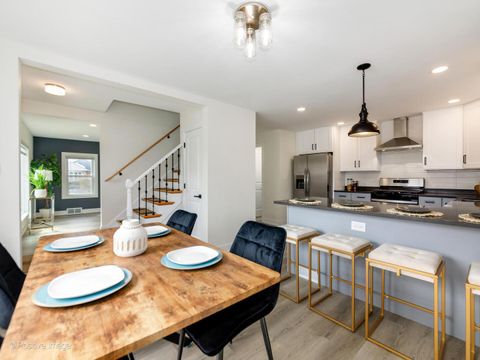 Tiny photo for 1701 N Sayre Avenue, Chicago, IL 60707 (MLS # 12635658)