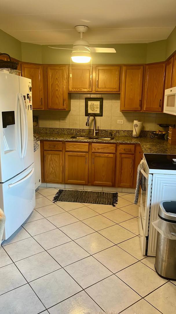 11103 S St Louis Avenue 203