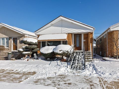 Photo of 6031 S Moody Avenue, Chicago, IL 60638 (MLS # 12555683)