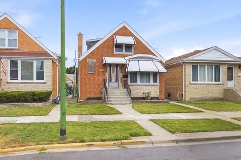 Photo of 7018 W Newport Avenue, Chicago, IL 60634 (MLS # 12717722)
