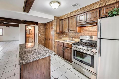 Tiny photo for 823 N Cambridge Row Road, Addison, IL 60101 (MLS # 12430216)