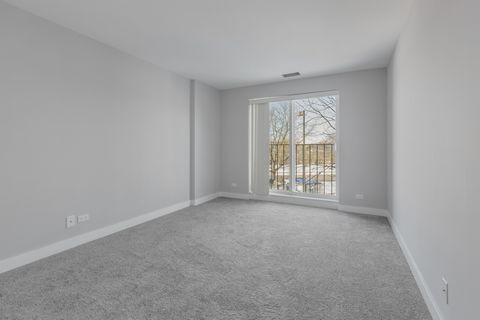 Tiny photo for 815 Leicester Road #211, Elk Grove Village, IL 60007 (MLS # 12558825)