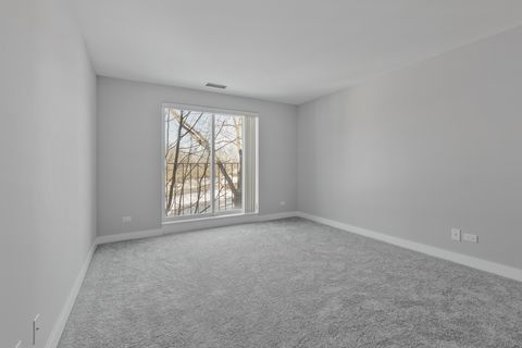 Tiny photo for 815 Leicester Road #211, Elk Grove Village, IL 60007 (MLS # 12558825)