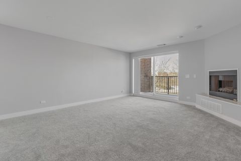 Tiny photo for 815 Leicester Road #211, Elk Grove Village, IL 60007 (MLS # 12558825)