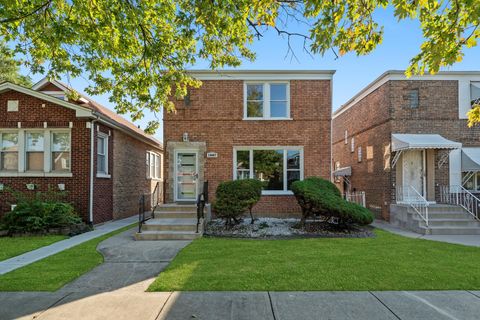 Photo of 10047 S Calumet Avenue, Chicago, IL 60628 (MLS # 12489803)