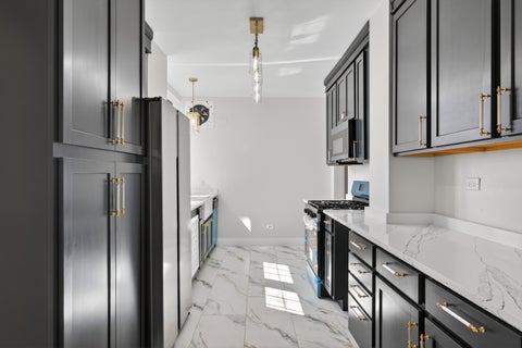Tiny photo for 6901 S Oglesby Avenue #10A, Chicago, IL 60649 (MLS # 12732486)