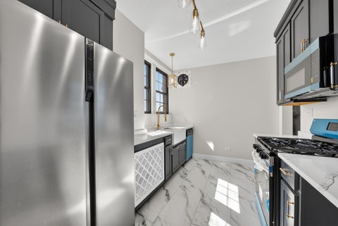 Tiny photo for 6901 S Oglesby Avenue #10A, Chicago, IL 60649 (MLS # 12732486)