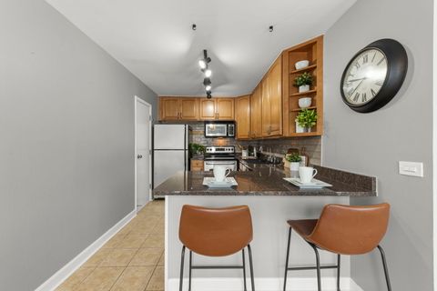 Tiny photo for 6008 LAKE Drive E #1A, Lisle, IL 60532 (MLS # 12507502)