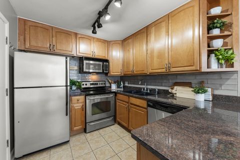 Tiny photo for 6008 LAKE Drive E #1A, Lisle, IL 60532 (MLS # 12507502)