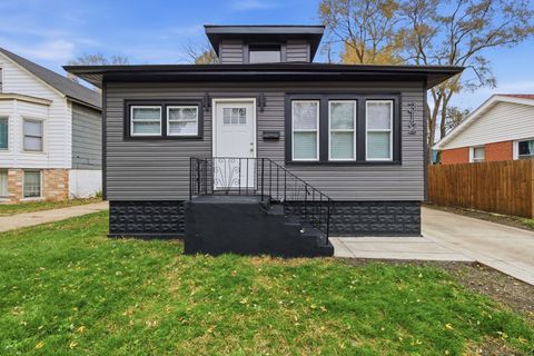 Photo of 312 E 136th Street, Chicago, IL 60827 (MLS # 12523070)
