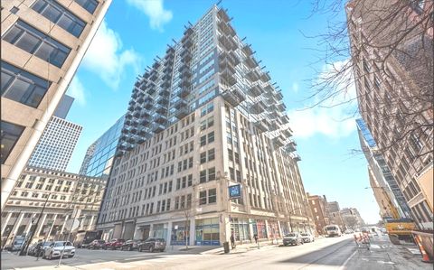 Photo of 565 W Quincy Street #1008, Chicago, IL 60661 (MLS # 12581040)