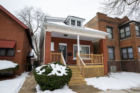 Photo of 7653 S Saint Lawrence Avenue, Chicago, IL 60619 (MLS # 12602219)