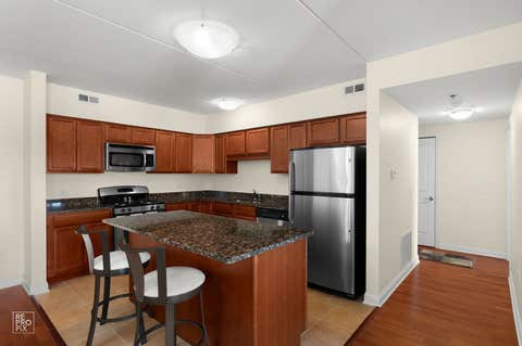Tiny photo for 9864 Leland Avenue #308, Schiller Park, IL 60176 (MLS # 12702277)