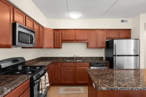 Tiny photo for 9864 Leland Avenue #308, Schiller Park, IL 60176 (MLS # 12702277)