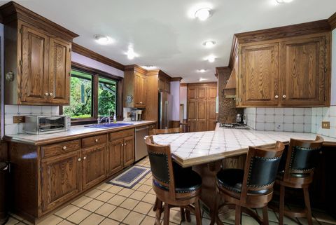 Tiny photo for 30W030 Schick Road, Bartlett, IL 60103 (MLS # 12493372)