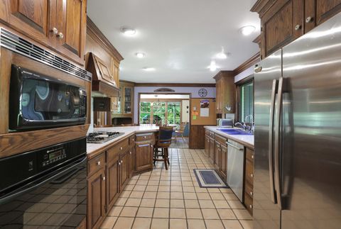 Tiny photo for 30W030 Schick Road, Bartlett, IL 60103 (MLS # 12493372)