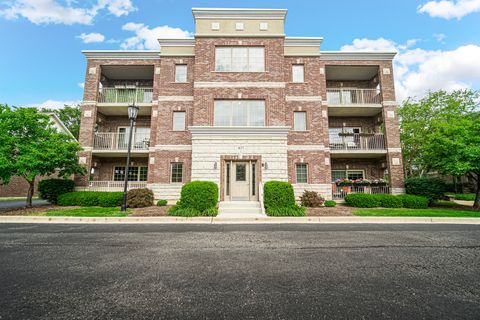 Photo of 405 W Pierce Road #201, Itasca, IL 60143 (MLS # 12666101)