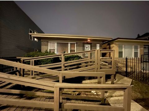 Photo of 1037 W 103rd Street, Chicago, IL 60643 (MLS # 12570869)