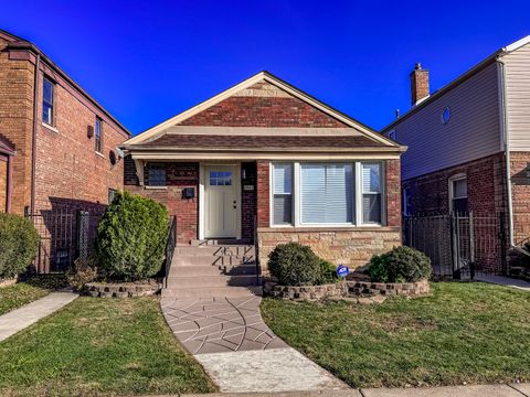 Photo of 8943 S Ridgeland Avenue, Chicago, IL 60617 (MLS # 12520001)