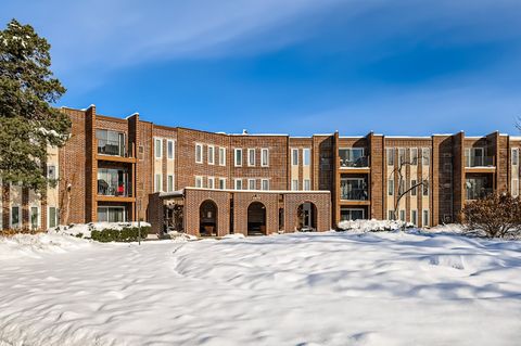 Photo of 1575 Sandpebble Drive #113, Wheeling, IL 60090 (MLS # 12531221)