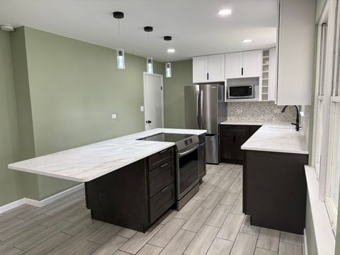 Tiny photo for 656 Springfield Avenue, Joliet, IL 60435 (MLS # 12470373)