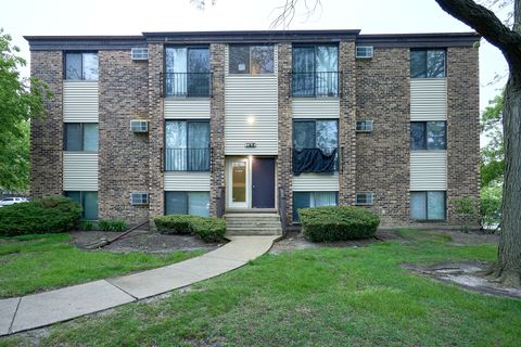 Photo of 148 Dunteman Drive #302, Glendale Heights, IL 60139 (MLS # 12631277)