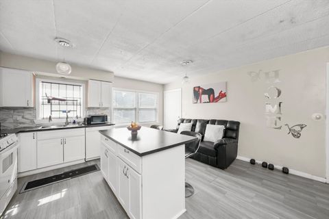 Tiny photo for 129 N Mason Avenue #105, Chicago, IL 60644 (MLS # 12450303)