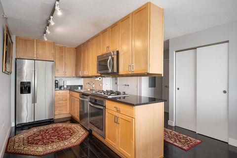 Tiny photo for 9715 Woods Drive #1403, Skokie, IL 60077 (MLS # 12673179)