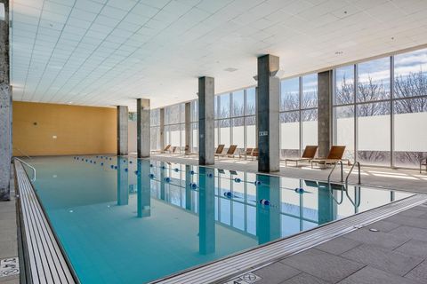 Tiny photo for 9715 Woods Drive #1403, Skokie, IL 60077 (MLS # 12673179)