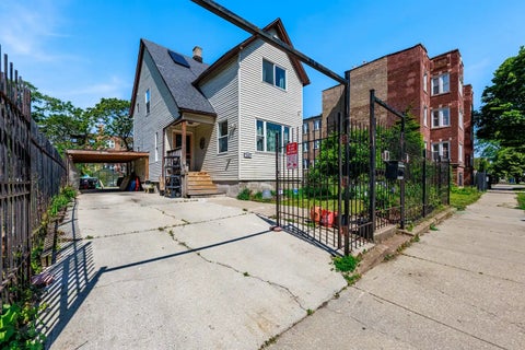 Photo of 7412 S PHILLIPS Avenue, Chicago, IL 60649 (MLS # 12664530)