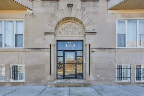 Photo of 313 E 60th Street #4, Chicago, IL 60637 (MLS # 12569483)