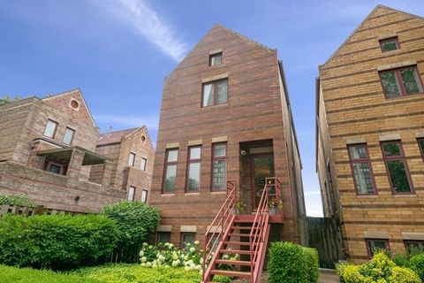 Photo of 1410 E 48th Street, Chicago, IL 60615 (MLS # 12609396)