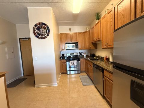 Tiny photo for 9355 IRVING PARK Road #409, Schiller Park, IL 60176 (MLS # 12580593)