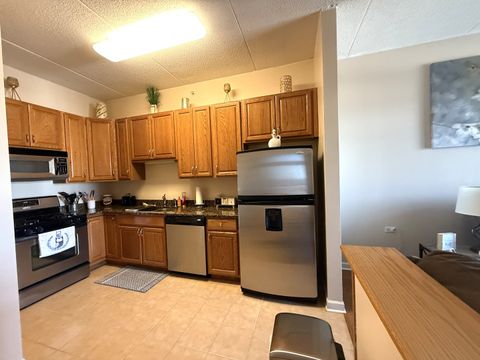 Tiny photo for 9355 IRVING PARK Road #409, Schiller Park, IL 60176 (MLS # 12580593)