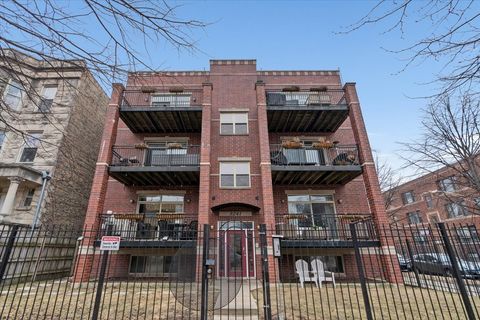 Photo of 3241 W PALMER Street #1W, Chicago, IL 60647 (MLS # 12583124)