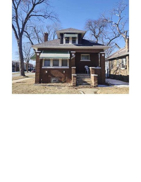 Photo of 8558 S Saint Lawrence Avenue, Chicago, IL 60619 (MLS # 12653197)