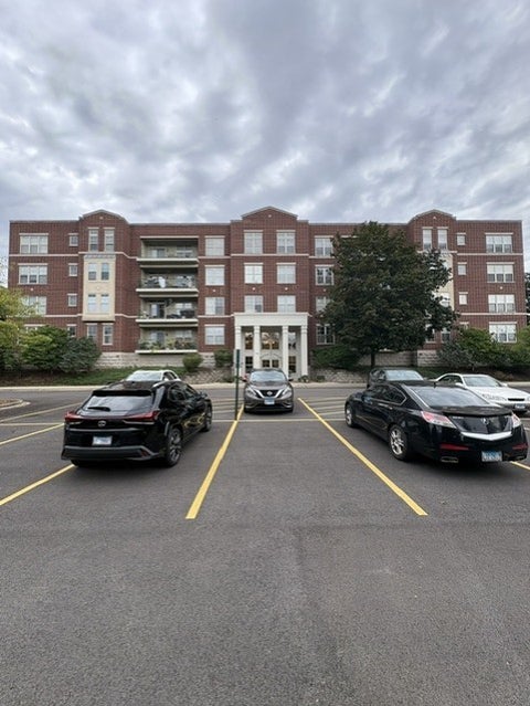Photo of 715 Astor Lane #201, Wheeling, IL 60090 (MLS # 12760771)