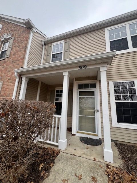 Photo of 309 Springbrook Trail S Trl, Oswego, IL 60543 (MLS # 12542909)