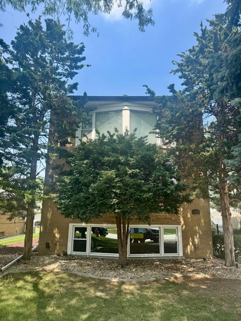 Photo of 10324 Canterbury Street #1, Westchester, IL 60154 (MLS # 12485244)