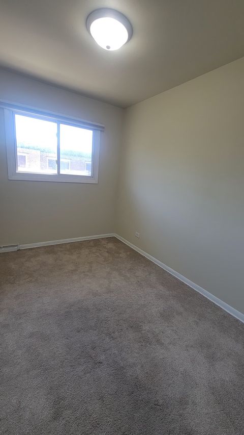 Tiny photo for 10081 FRONTAGE Road #F, Skokie, IL 60076 (MLS # 12443200)