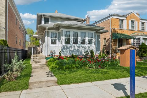 Photo of 6506 N Maplewood Avenue, Chicago, IL 60645 (MLS # 12626432)