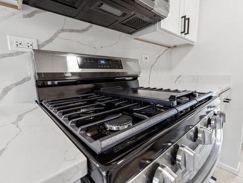 Tiny photo for 1916 Quaker Hollow Lane, Streamwood, IL 60107 (MLS # 12489861)