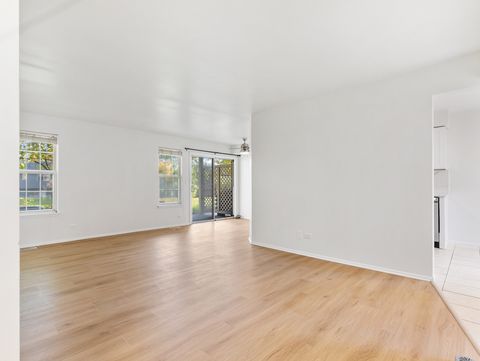 Tiny photo for 1916 Quaker Hollow Lane, Streamwood, IL 60107 (MLS # 12489861)