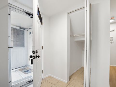 Tiny photo for 1916 Quaker Hollow Lane, Streamwood, IL 60107 (MLS # 12489861)