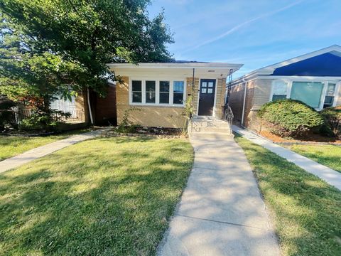 Photo of 520 W 97th Street, Chicago, IL 60628 (MLS # 12476453)