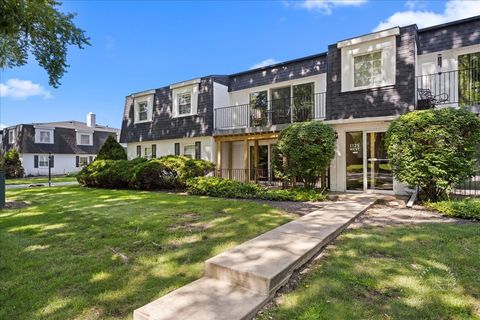 Photo of 1125 Royal Saint George Drive #208, Naperville, IL 60563 (MLS # 12454817)