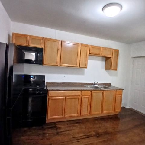 Tiny photo for 2056 N Kilpatrick Avenue #1N, Chicago, IL 60639 (MLS # 12524763)