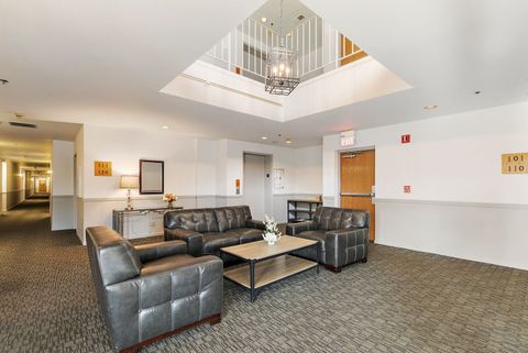 Tiny photo for 805 Leicester Road #211, Elk Grove Village, IL 60007 (MLS # 12584736)